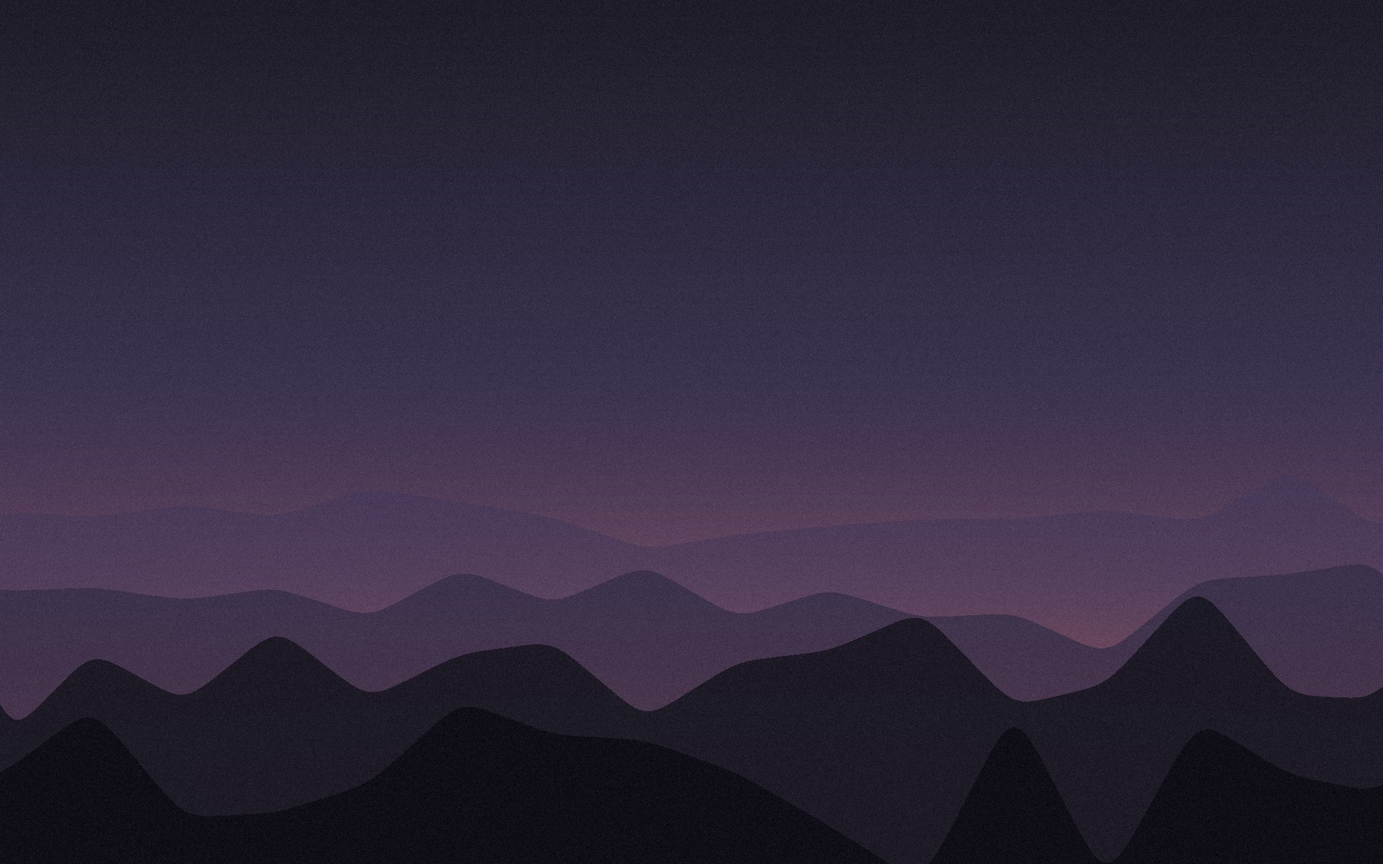 Dusk over mountain ridges