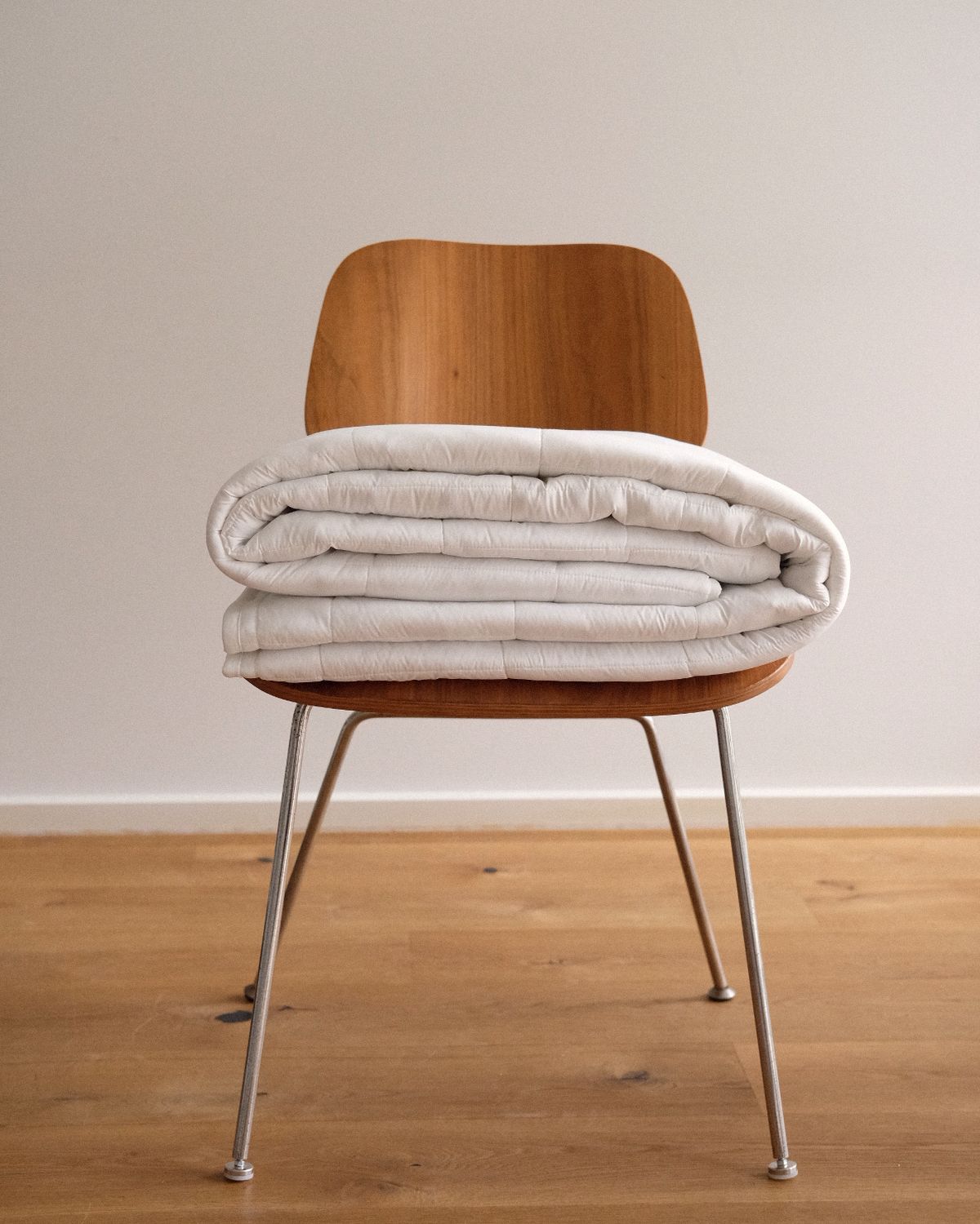 Litual folded on a wooden chair